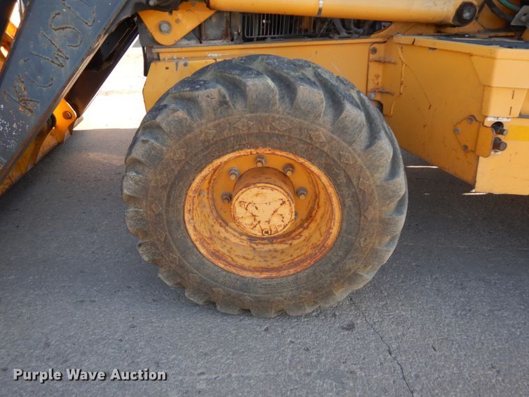 image for item DH7036 2012 John Deere 410K  backhoe