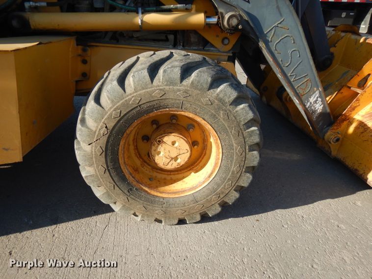 image for item DH7036 2012 John Deere 410K  backhoe