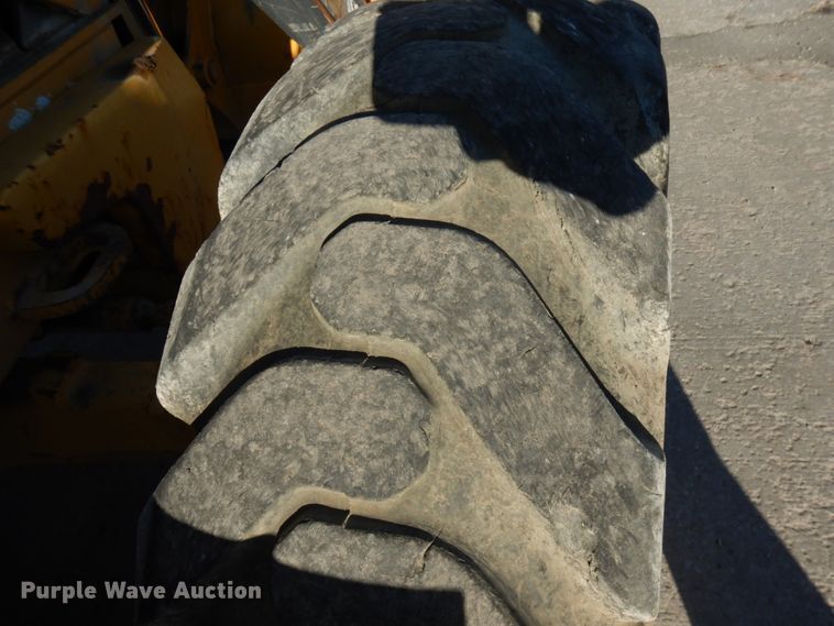 image for item DH7036 2012 John Deere 410K  backhoe