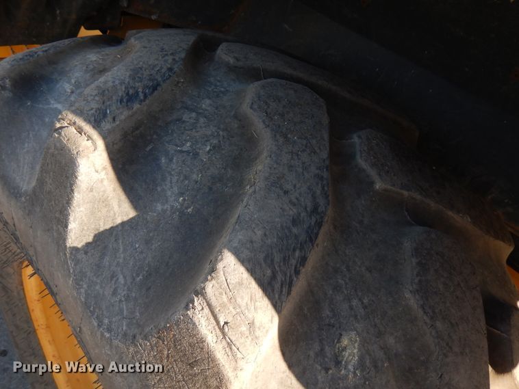 image for item DH7036 2012 John Deere 410K  backhoe