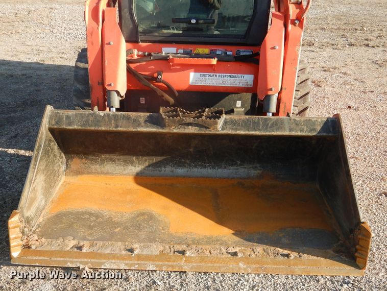 image for item DI3529 2017 Kubota SSV65  skid steer loader