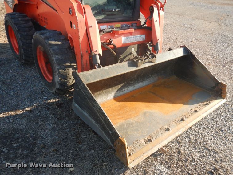 image for item DI3529 2017 Kubota SSV65  skid steer loader