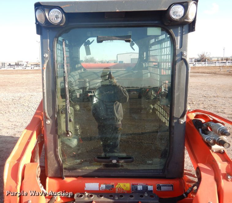 image for item DI3529 2017 Kubota SSV65  skid steer loader