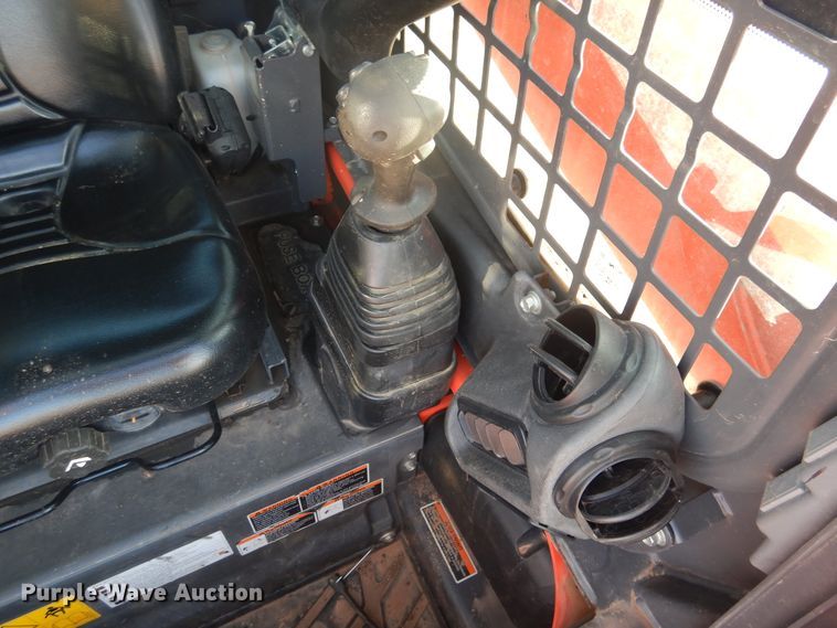 image for item DI3529 2017 Kubota SSV65  skid steer loader