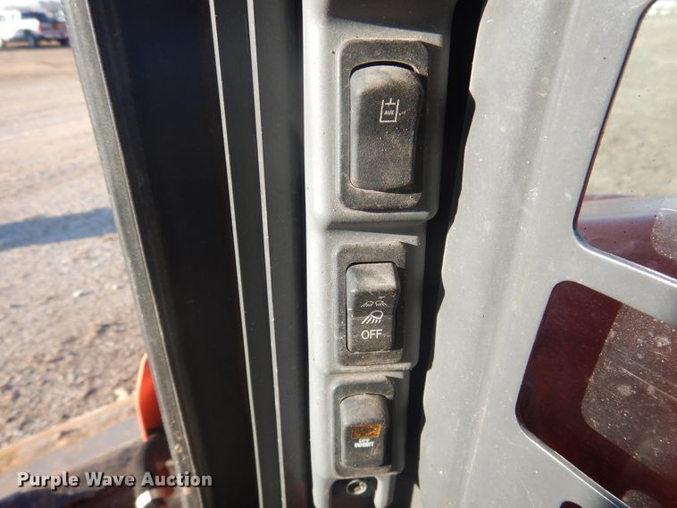 image for item DI3529 2017 Kubota SSV65  skid steer loader