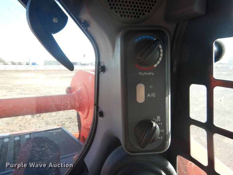 image for item DI3529 2017 Kubota SSV65  skid steer loader