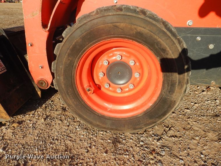 image for item DI3529 2017 Kubota SSV65  skid steer loader