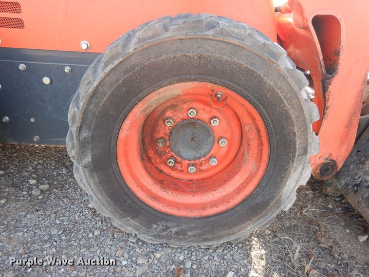 image for item DI3529 2017 Kubota SSV65  skid steer loader