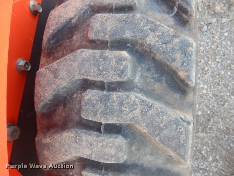 image for item DI3529 2017 Kubota SSV65  skid steer loader