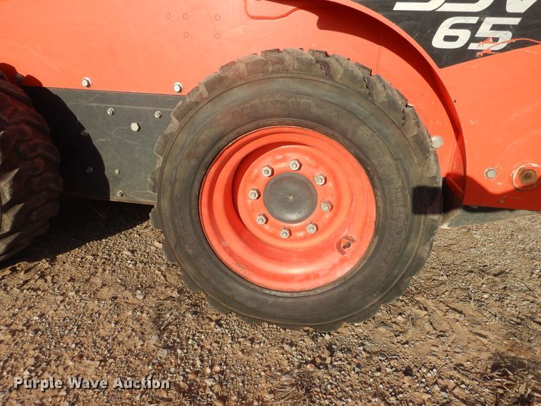 image for item DI3529 2017 Kubota SSV65  skid steer loader