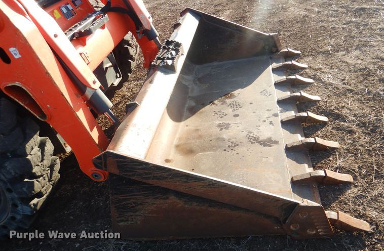 image for item DI3532 2017 Kubota SSV75  skid steer loader