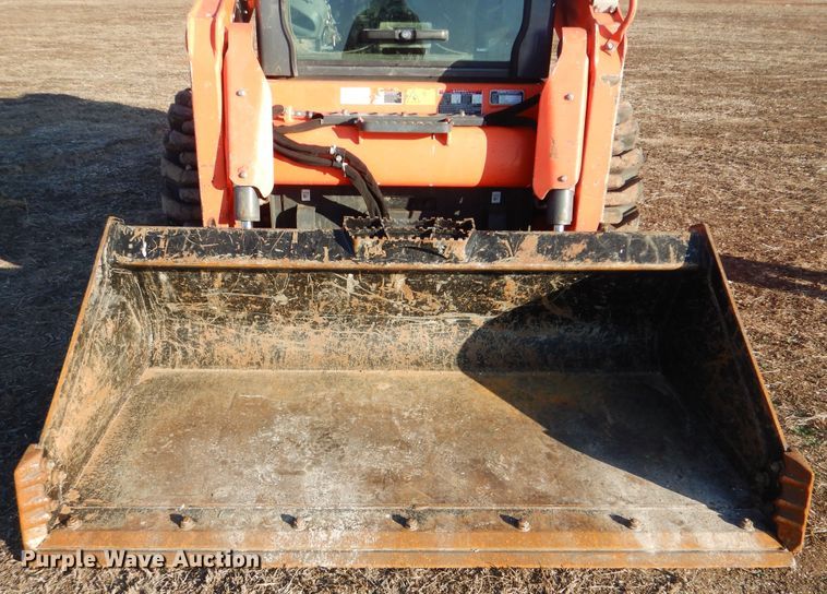 image for item DI3533 2019 Kubota SSV65  skid steer loader