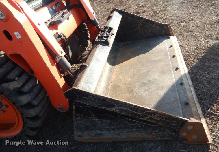 image for item DI3533 2019 Kubota SSV65  skid steer loader