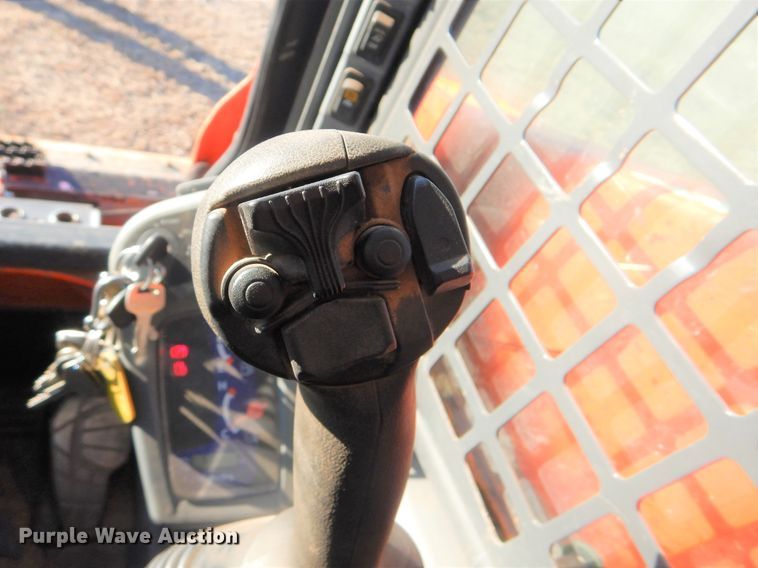 image for item DI3533 2019 Kubota SSV65  skid steer loader