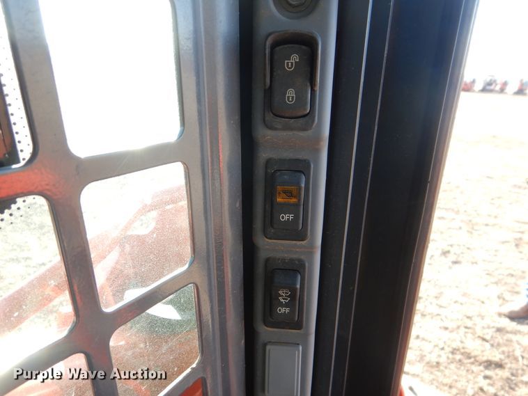 image for item DI3533 2019 Kubota SSV65  skid steer loader