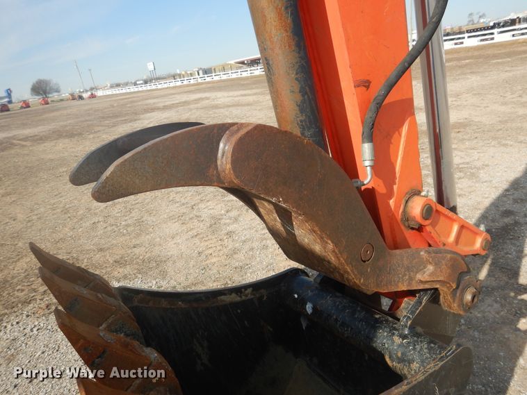 image for item DI3555 2018 Kubota M62  backhoe