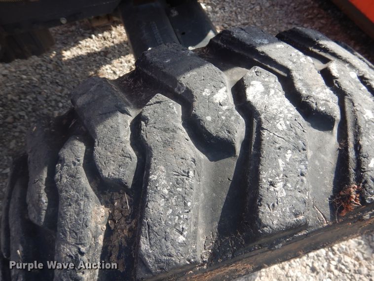 image for item DI3555 2018 Kubota M62  backhoe