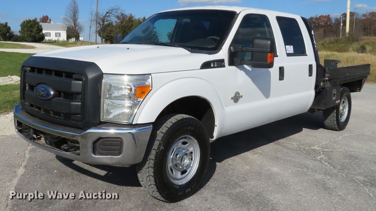 image for item DI3856 2014 Ford F250 Super Duty XL  Crew Cab flatbed pickup truck