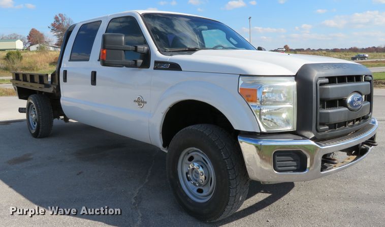 image for item DI3856 2014 Ford F250 Super Duty XL  Crew Cab flatbed pickup truck