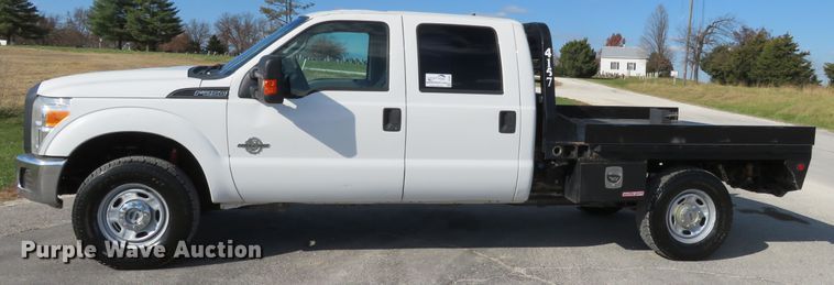 image for item DI3856 2014 Ford F250 Super Duty XL  Crew Cab flatbed pickup truck