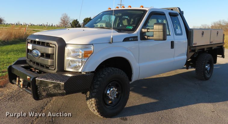 image for item DI3880 2011 Ford F350 Super Duty XL  SuperCab flatbed pickup truck