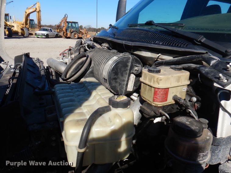 image for item DY9602 2005 GMC C5500  Crew Cab flatbed truck