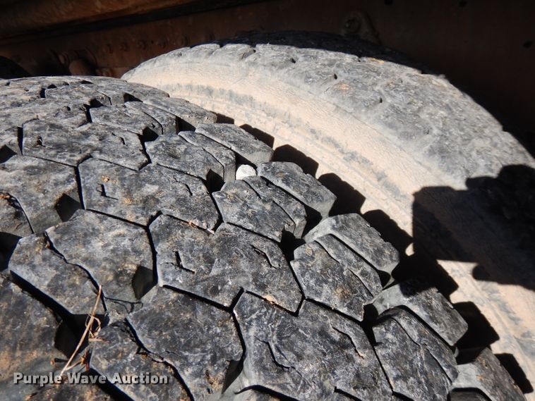 image for item FW9909 2000 Freightliner FL80  water truck