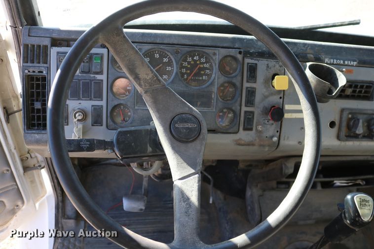 image for item DD6156 1998 Freightliner FL70  flatbed truck