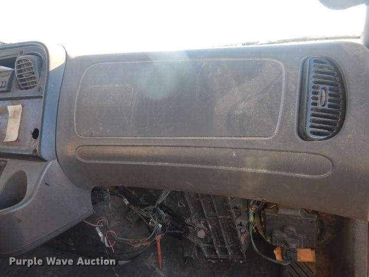 image for item DG8388 2004 Freightliner Business Class M2  winch truck