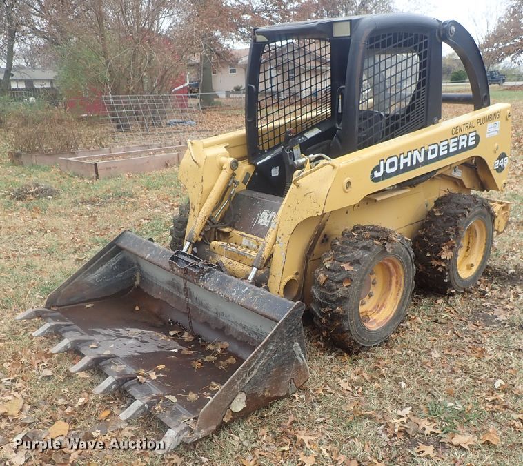 image for item DI7308 1999 John Deere 240  skid steer loader