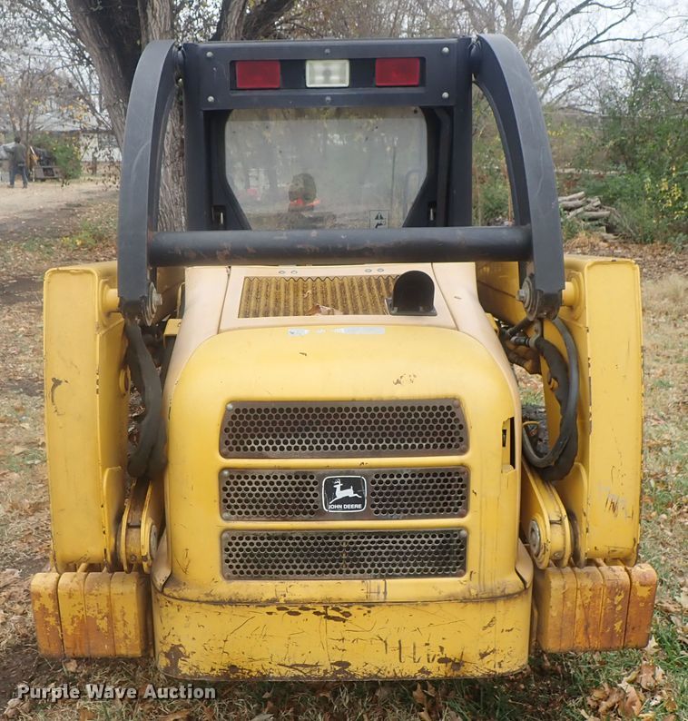 image for item DI7308 1999 John Deere 240  skid steer loader