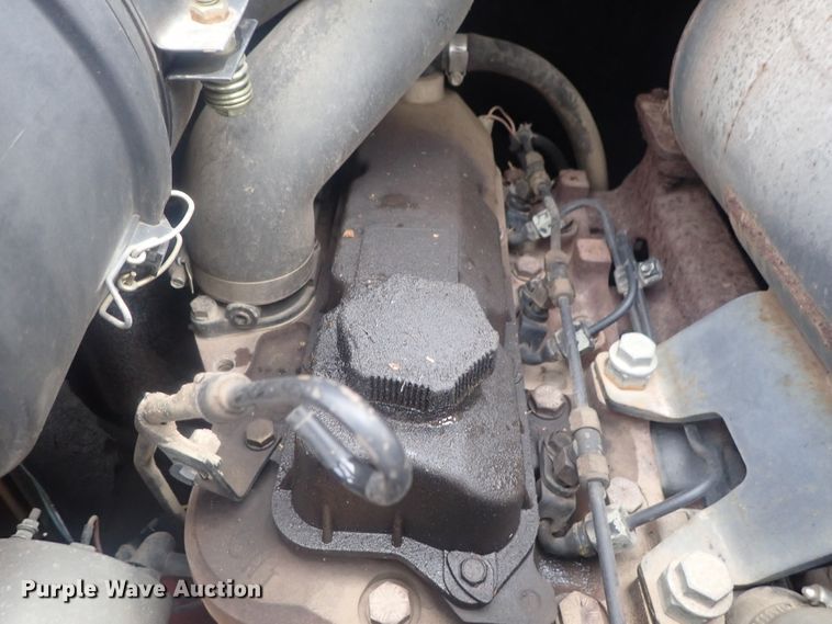 image for item DI7308 1999 John Deere 240  skid steer loader