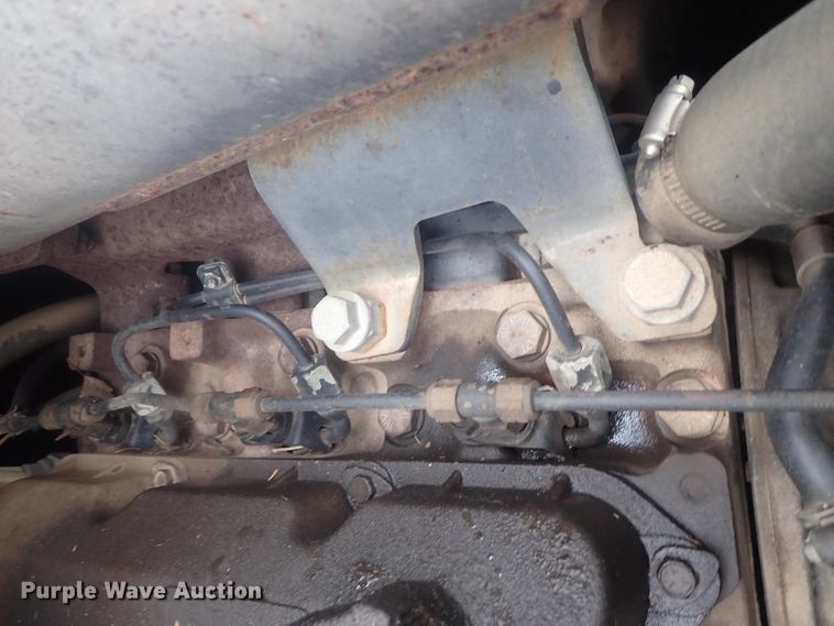 image for item DI7308 1999 John Deere 240  skid steer loader