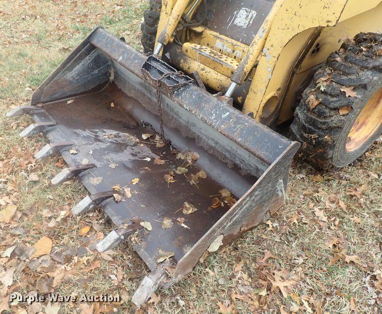 image for item DI7308 1999 John Deere 240  skid steer loader