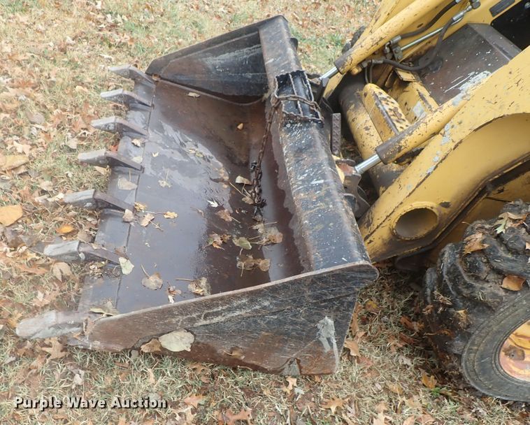 image for item DI7308 1999 John Deere 240  skid steer loader