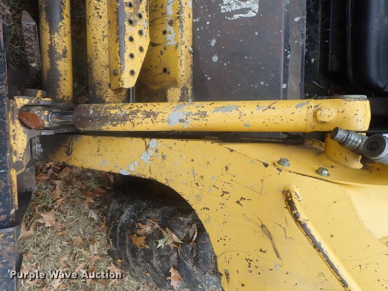 image for item DI7308 1999 John Deere 240  skid steer loader