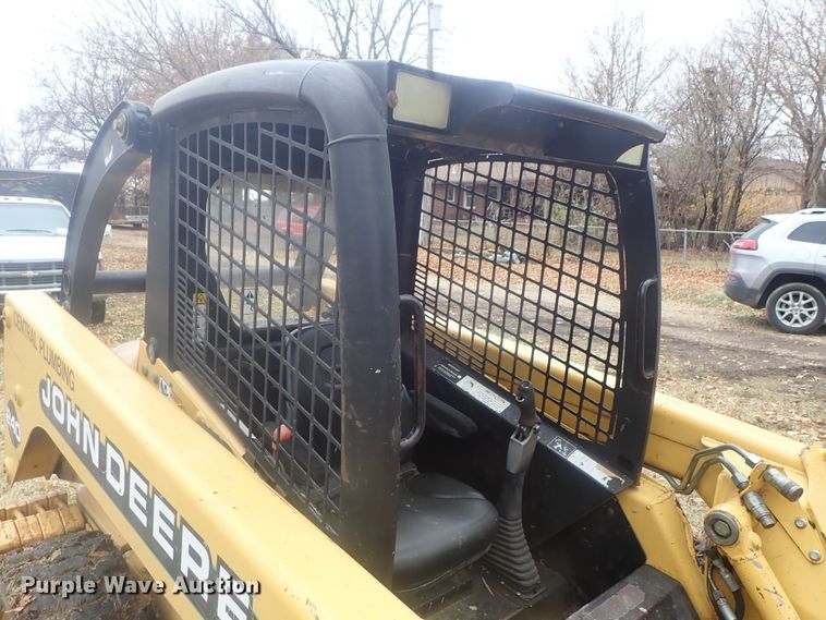 image for item DI7308 1999 John Deere 240  skid steer loader