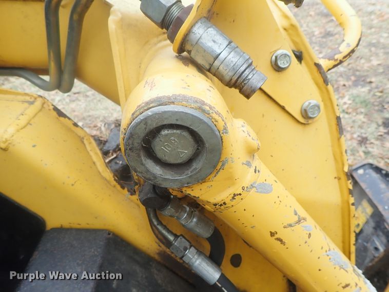 image for item DI7308 1999 John Deere 240  skid steer loader