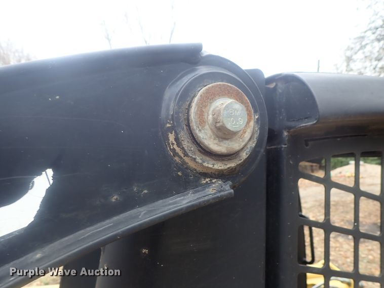 image for item DI7308 1999 John Deere 240  skid steer loader