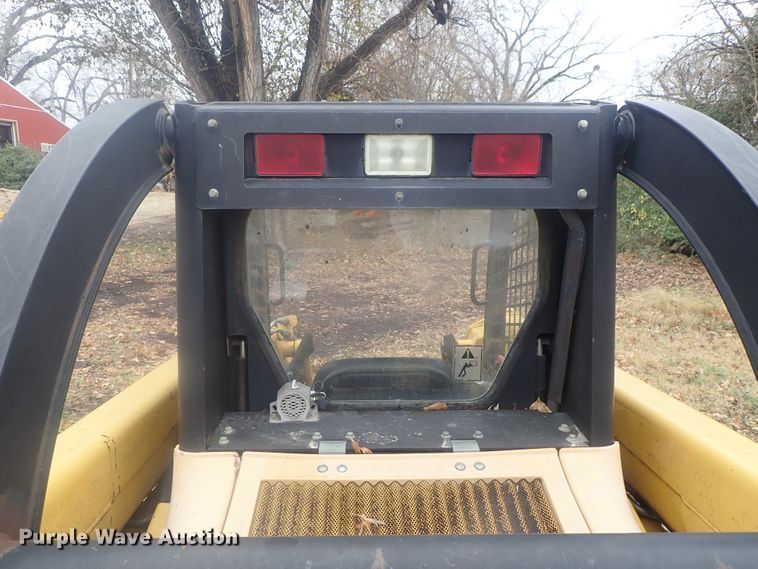 image for item DI7308 1999 John Deere 240  skid steer loader