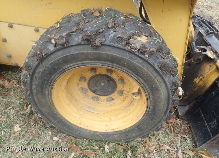 image for item DI7308 1999 John Deere 240  skid steer loader