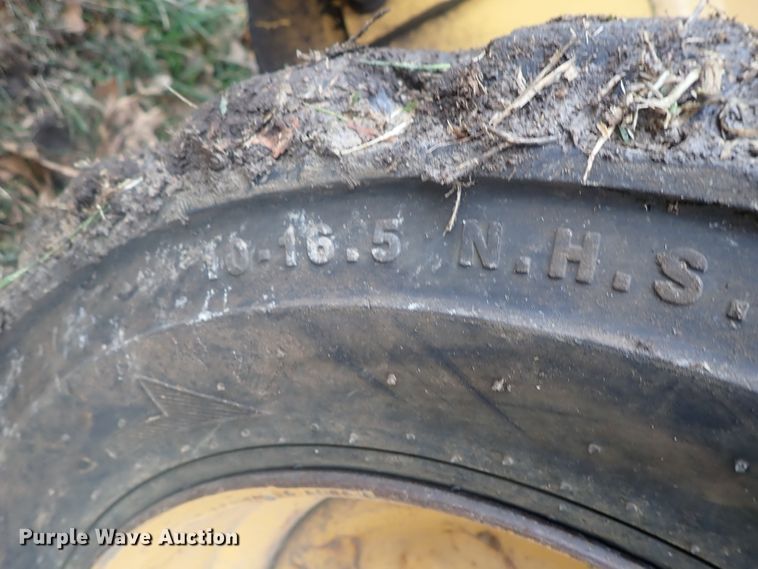 image for item DI7308 1999 John Deere 240  skid steer loader