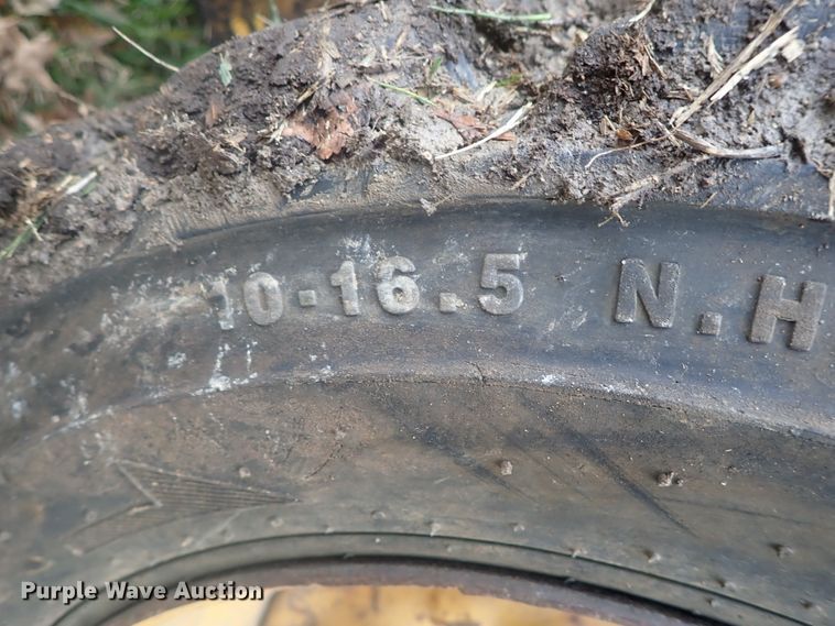 image for item DI7308 1999 John Deere 240  skid steer loader