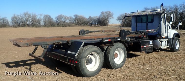 image for item DI7354 2003 Mack CV713  roll-off container truck