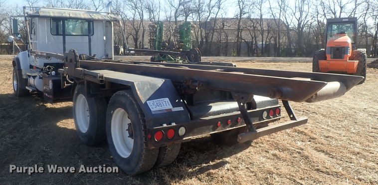 image for item DI7354 2003 Mack CV713  roll-off container truck