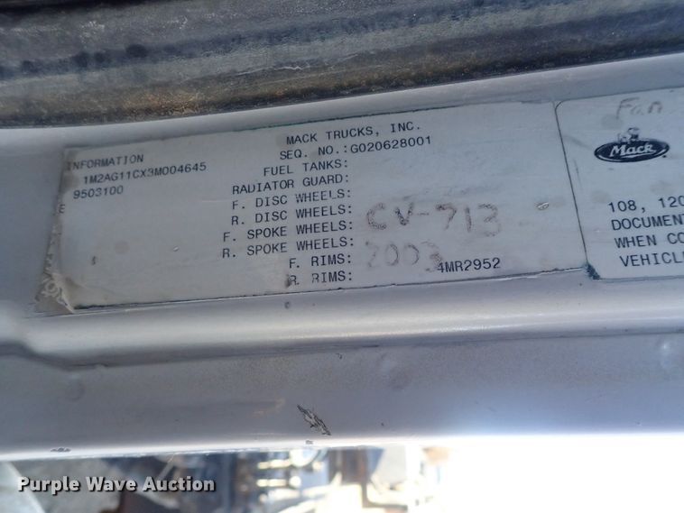 image for item DI7354 2003 Mack CV713  roll-off container truck