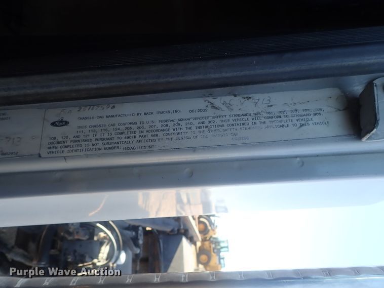 image for item DI7354 2003 Mack CV713  roll-off container truck