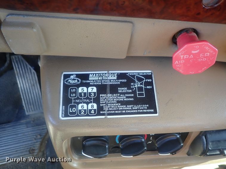 image for item DI7354 2003 Mack CV713  roll-off container truck