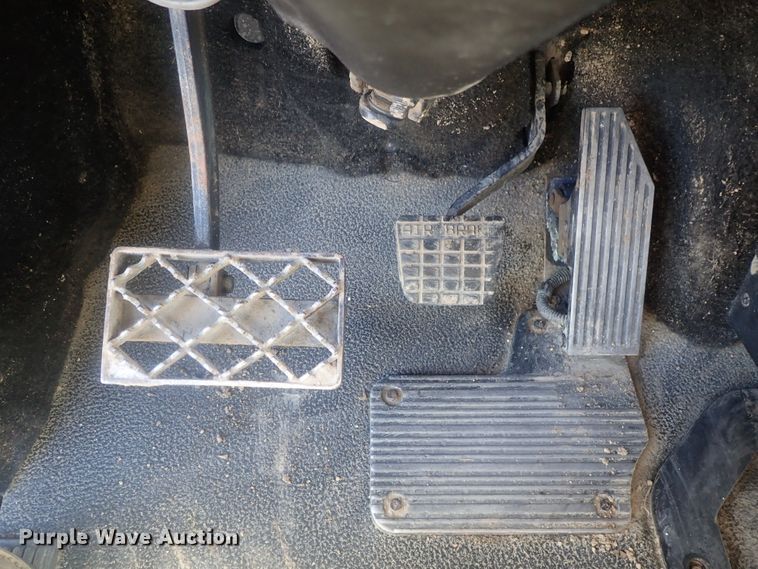 image for item DI7354 2003 Mack CV713  roll-off container truck