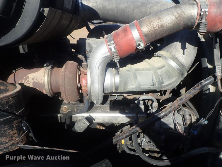 image for item DI7354 2003 Mack CV713  roll-off container truck